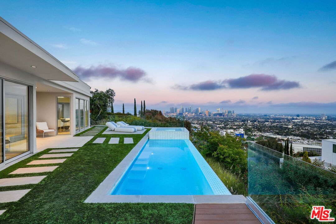 a view of a yard with a patio