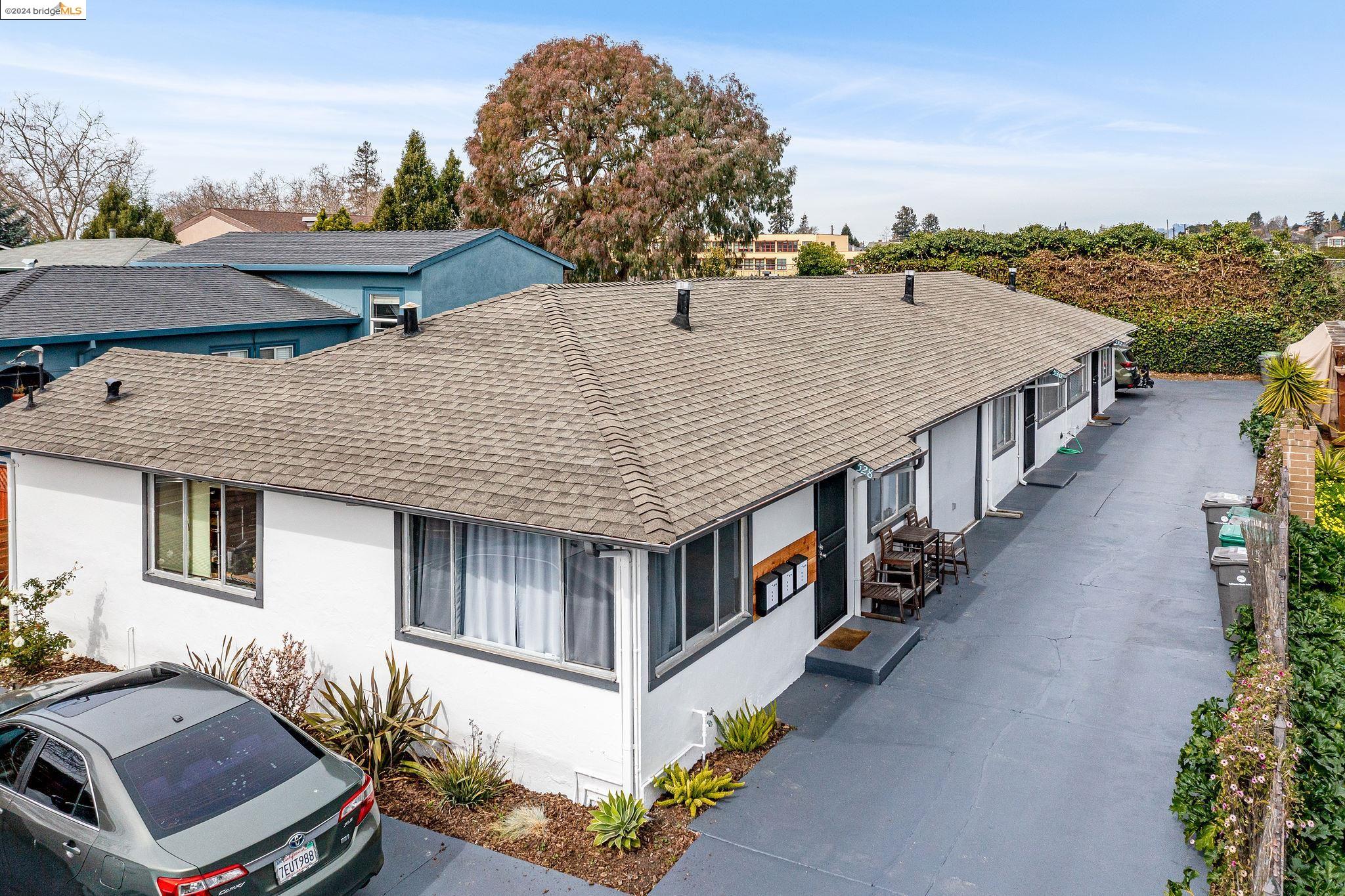 a aerial view of a house with a yard