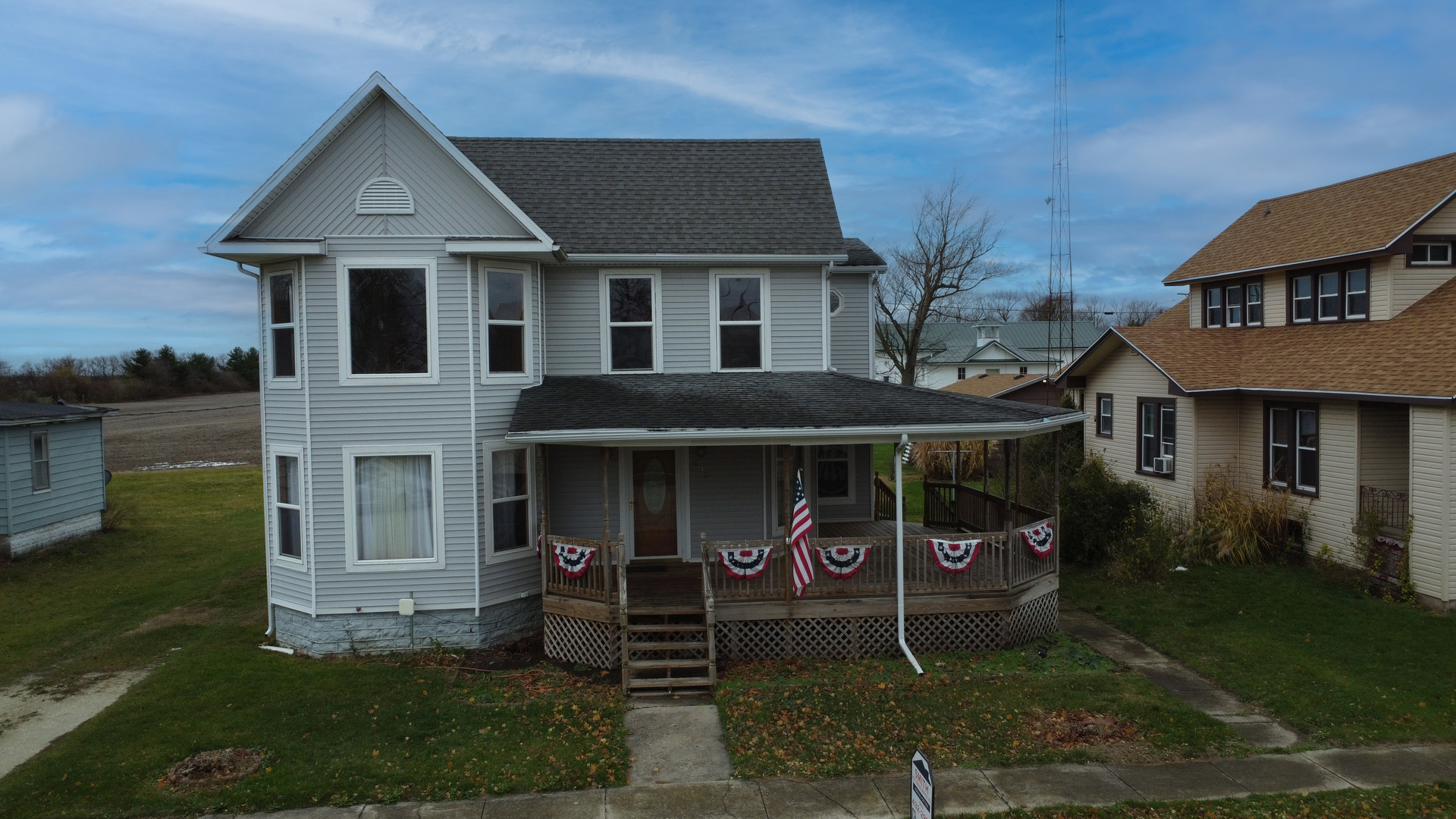 front view of a house with a yard