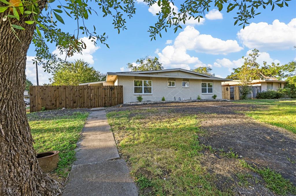 a house view with a garden space