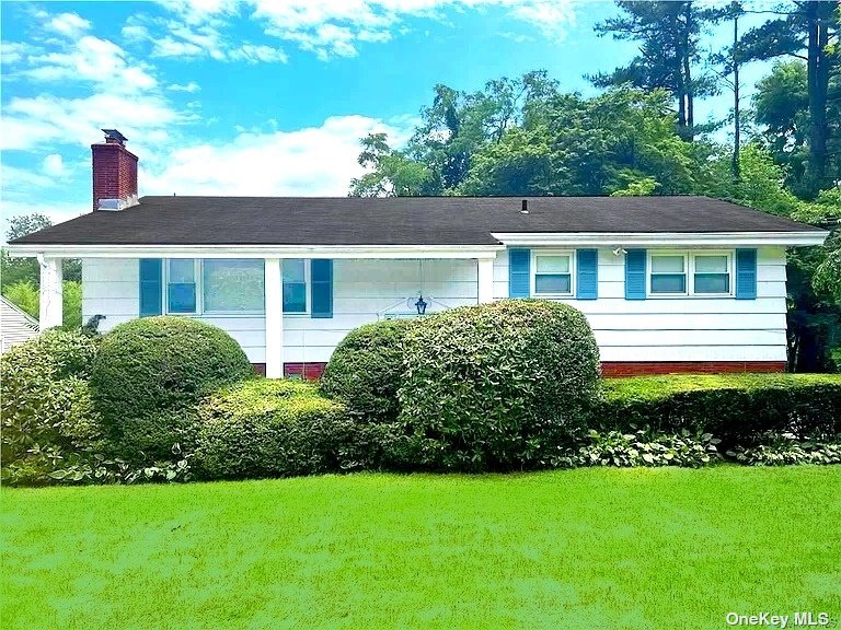 a view of a house with a garden