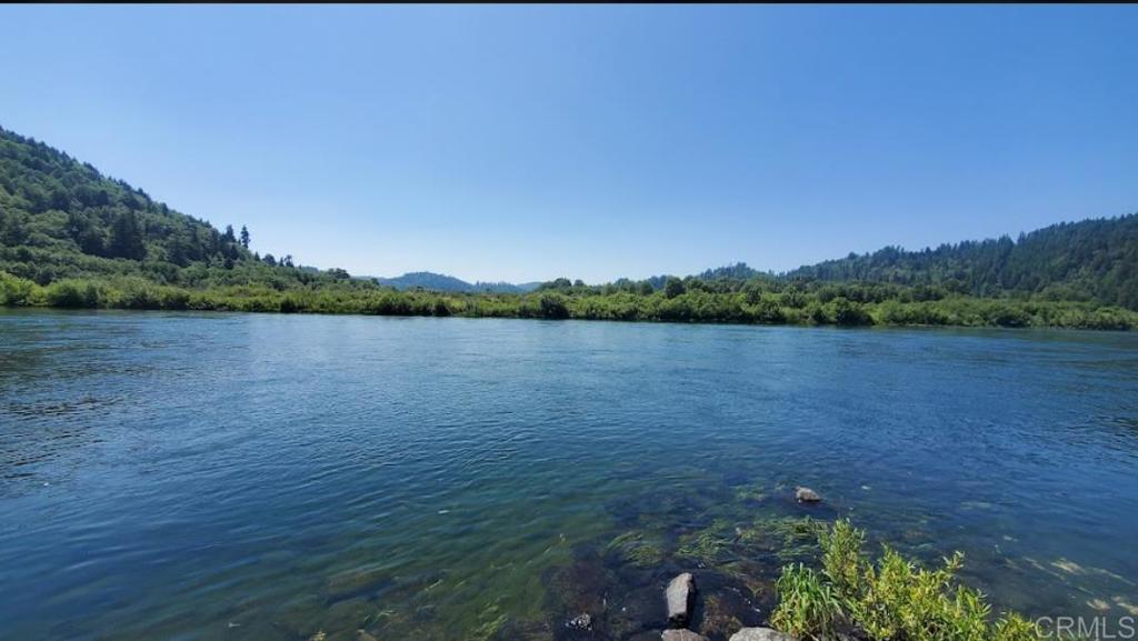 a view of a lake from a yard