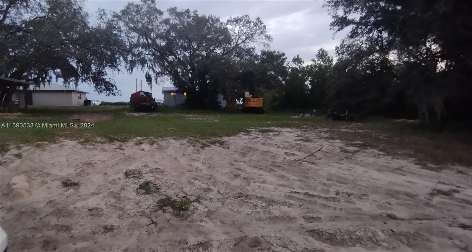 a view of backyard with green space