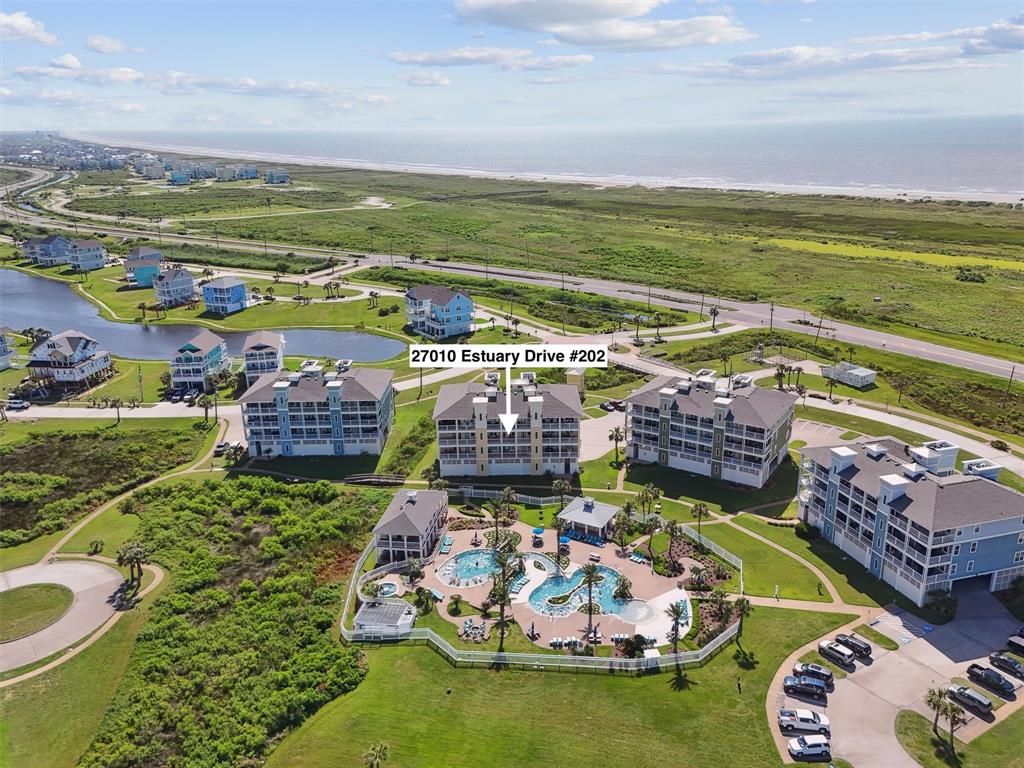 Experience luxury coastal living in this second floor two-bedroom, two-bath bayfront condo nestled in the sought-after Pointe West Resort community on Galveston Island.