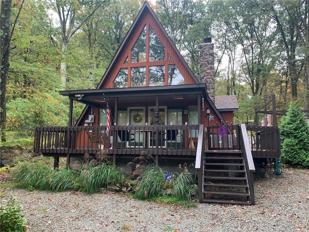 a front view of a house with a porch