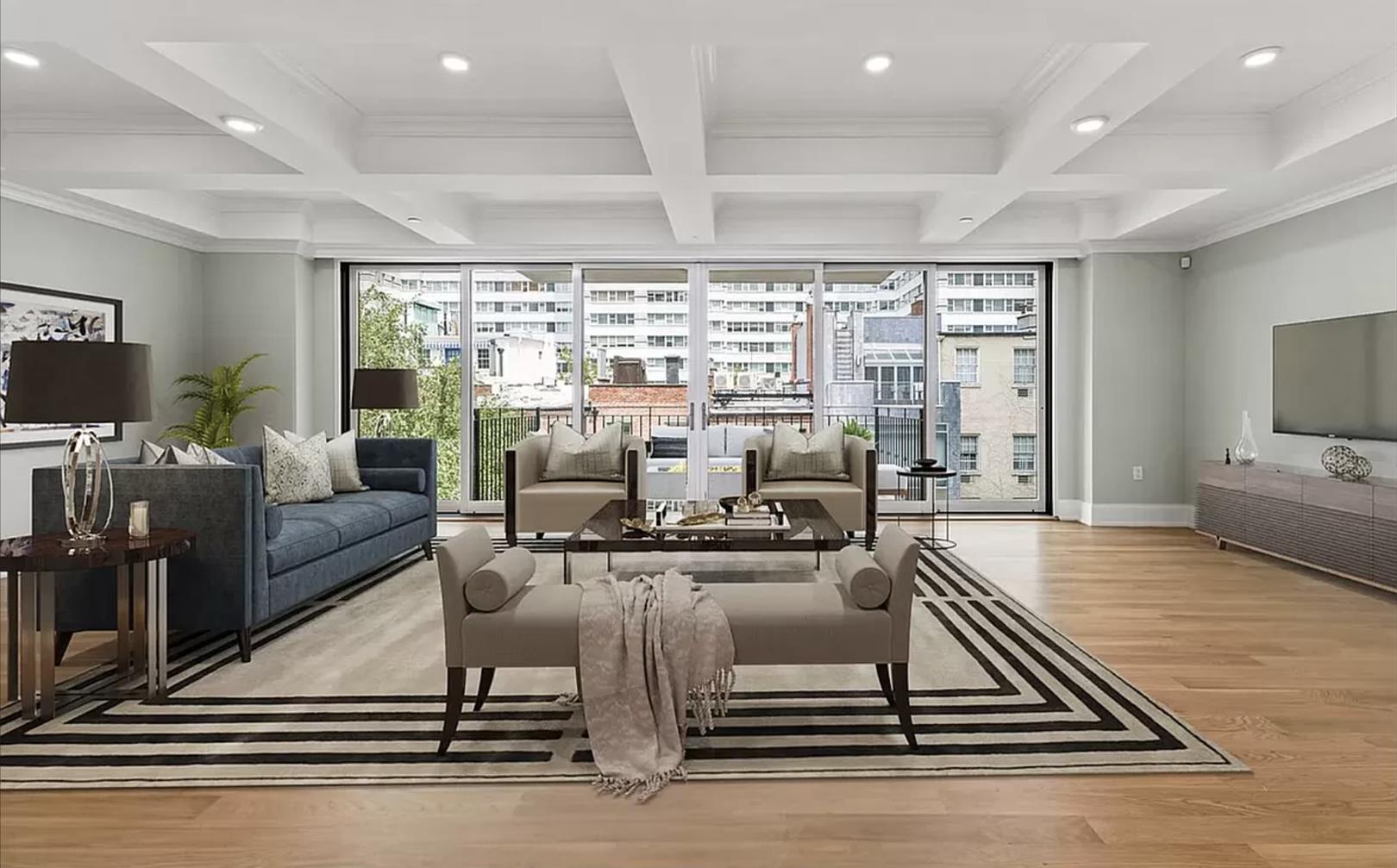 a living room with fireplace furniture and a flat screen tv