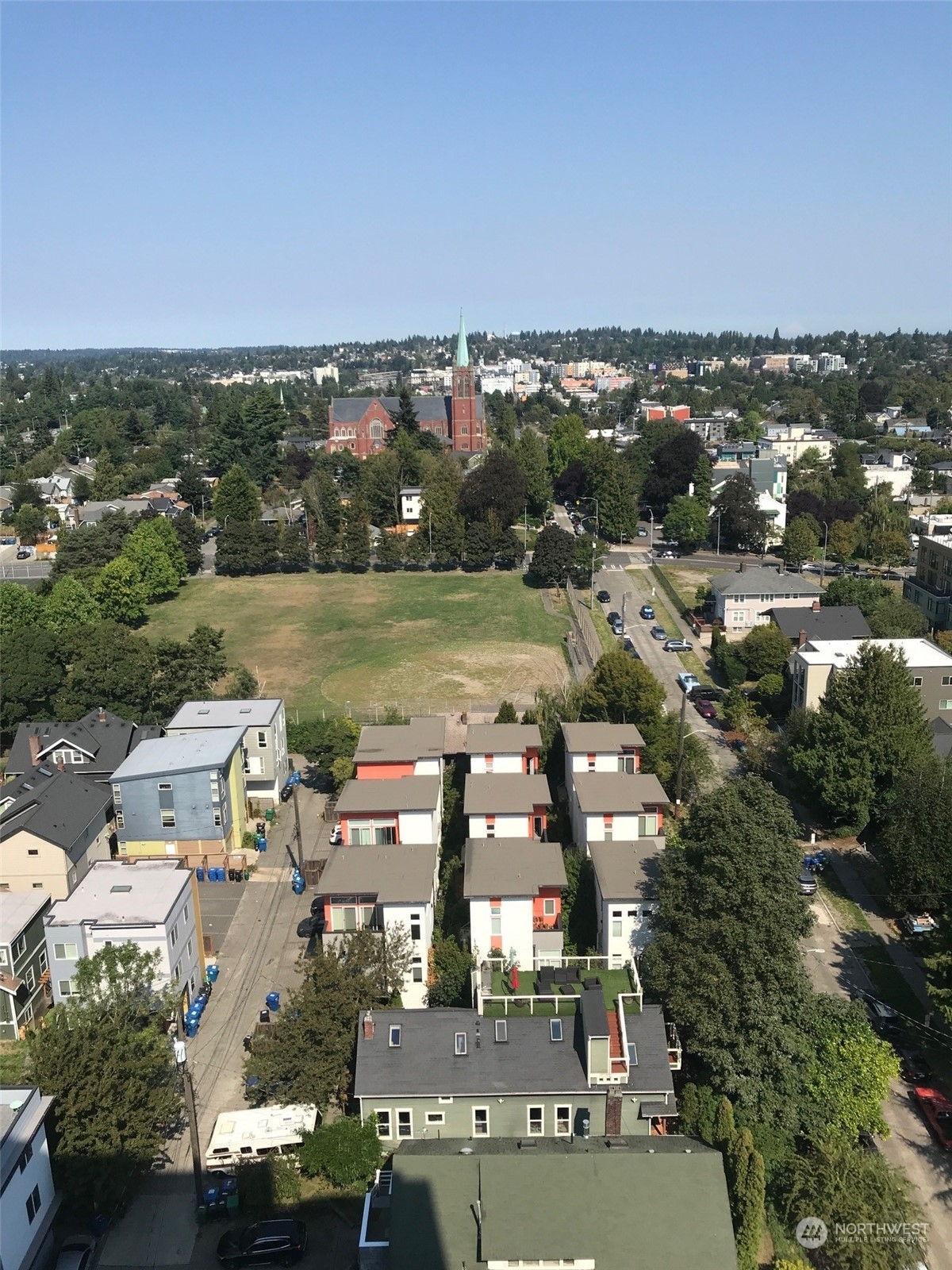 an aerial view of a city with lots of residential buildings