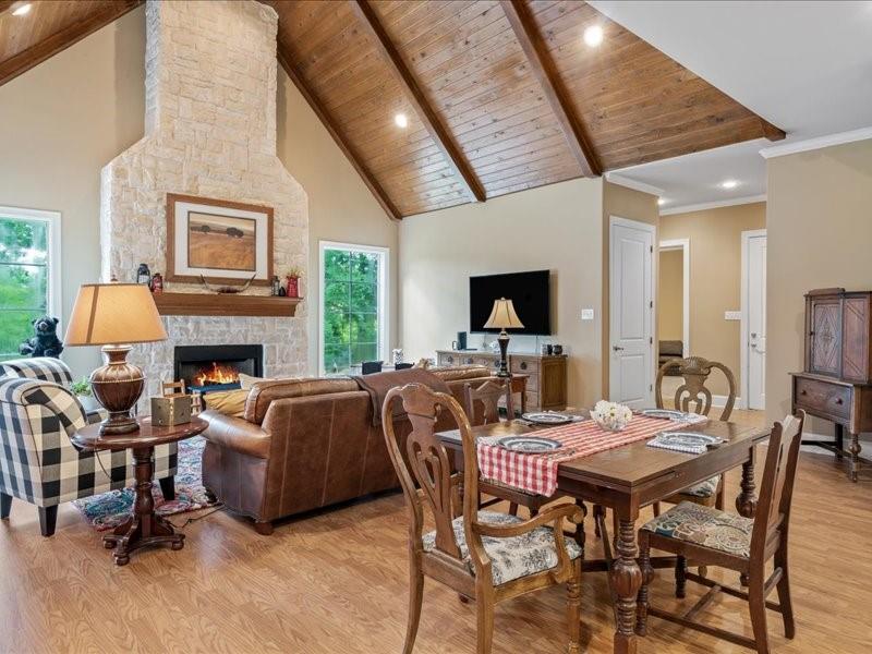 a view of a livingroom with furniture and a fireplace