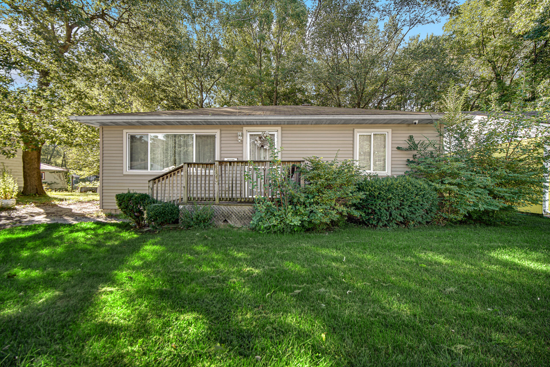 front view of a house with a yard