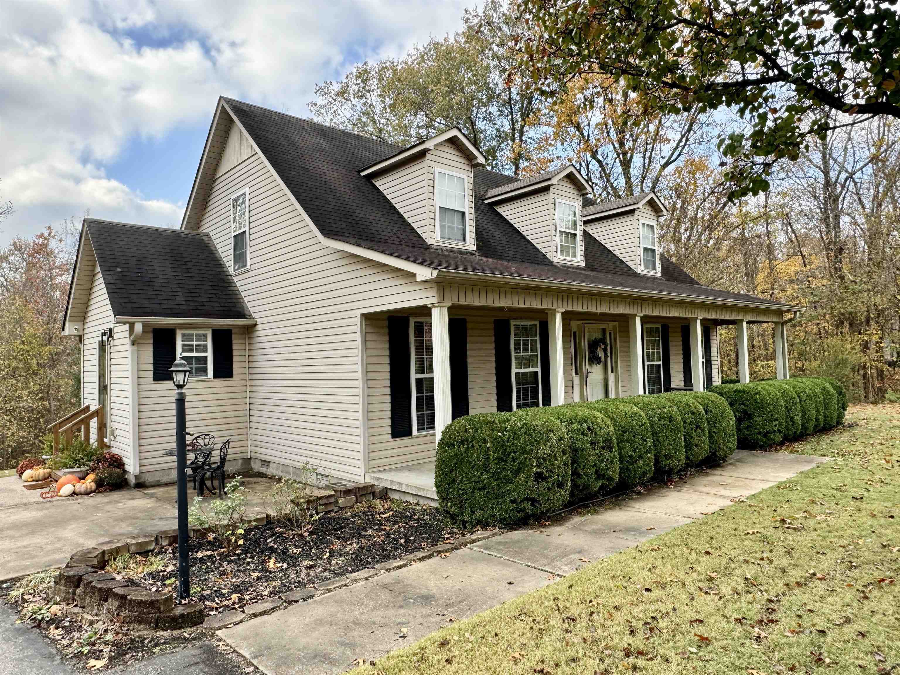 View of front of house with covered porch