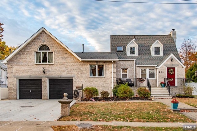 a front view of a house with yard