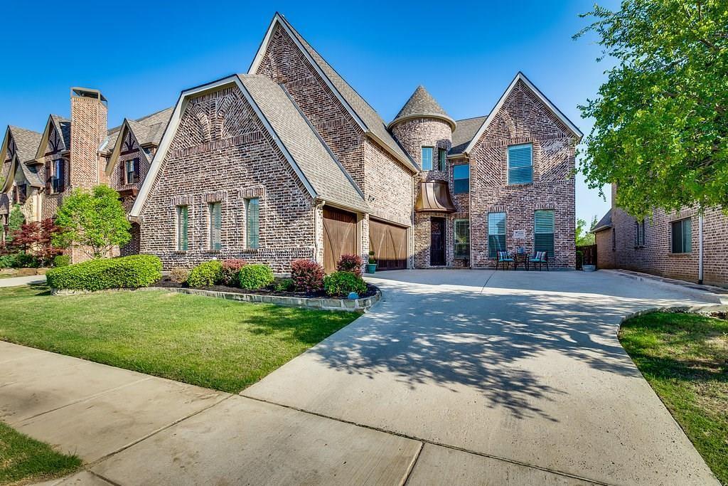 a view of a big yard next to a house