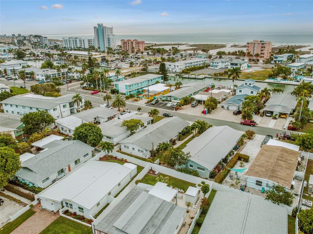 an aerial view of a city with parking