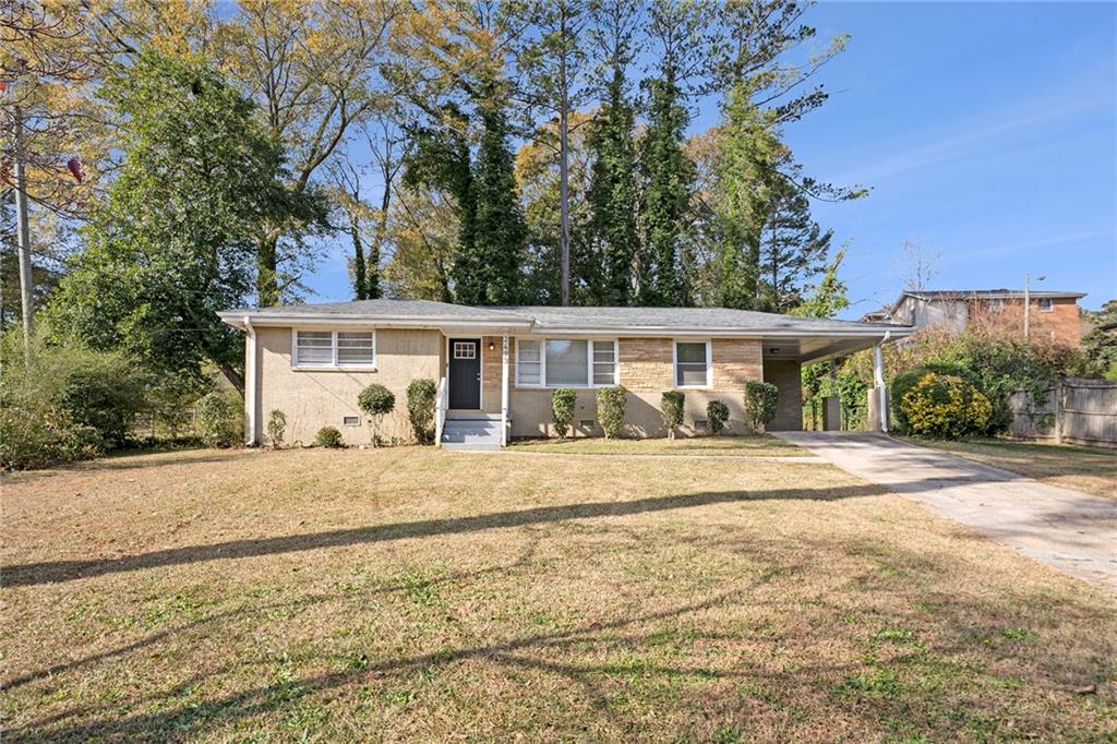 front view of a house with a big yard