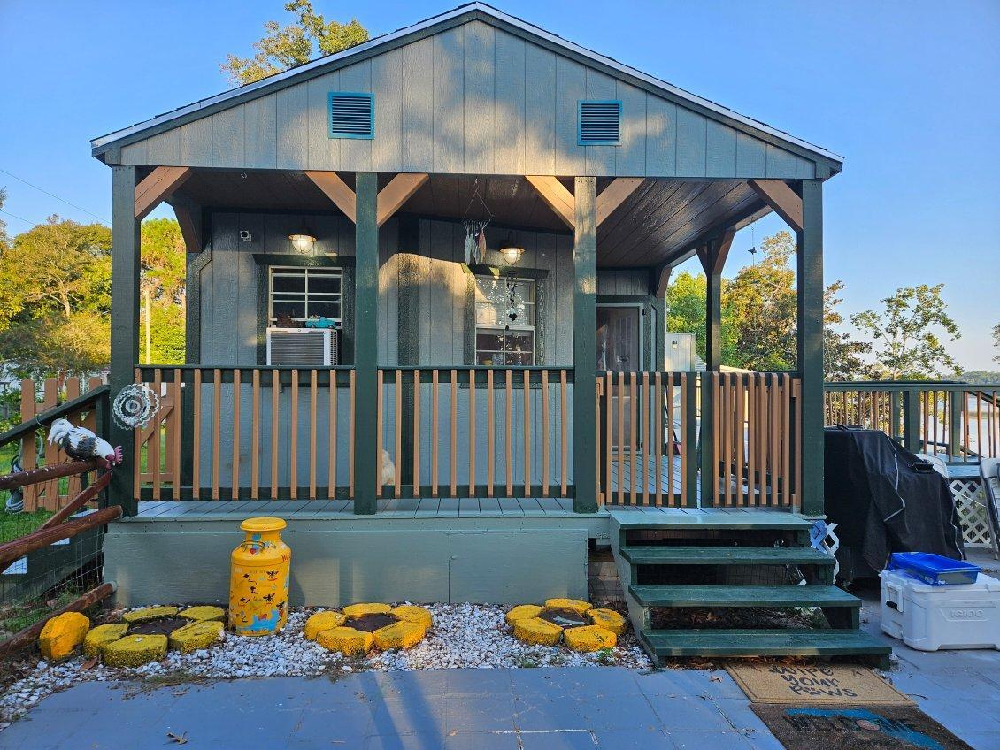 a front view of a house having patio