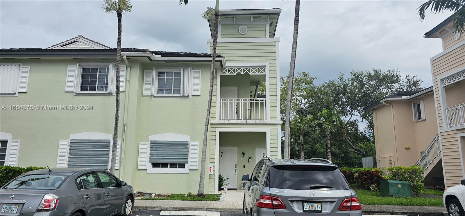 a car parked in front of a house