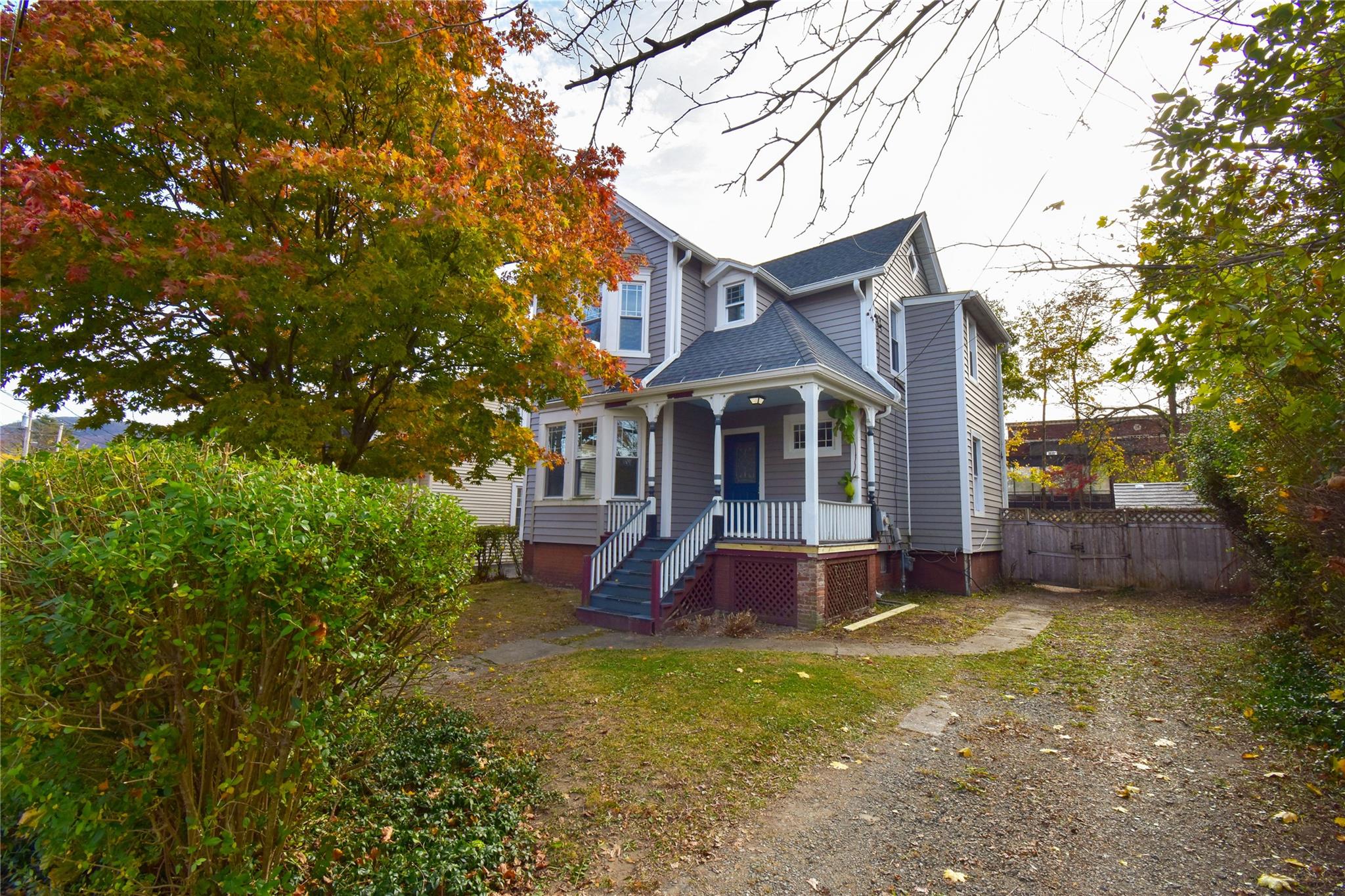 a view of a house with a yard