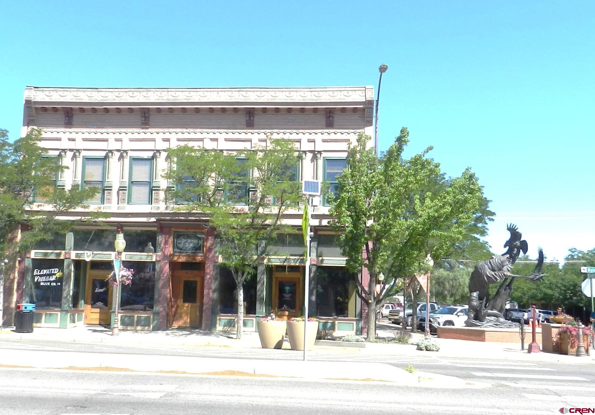 a view of a building and a street