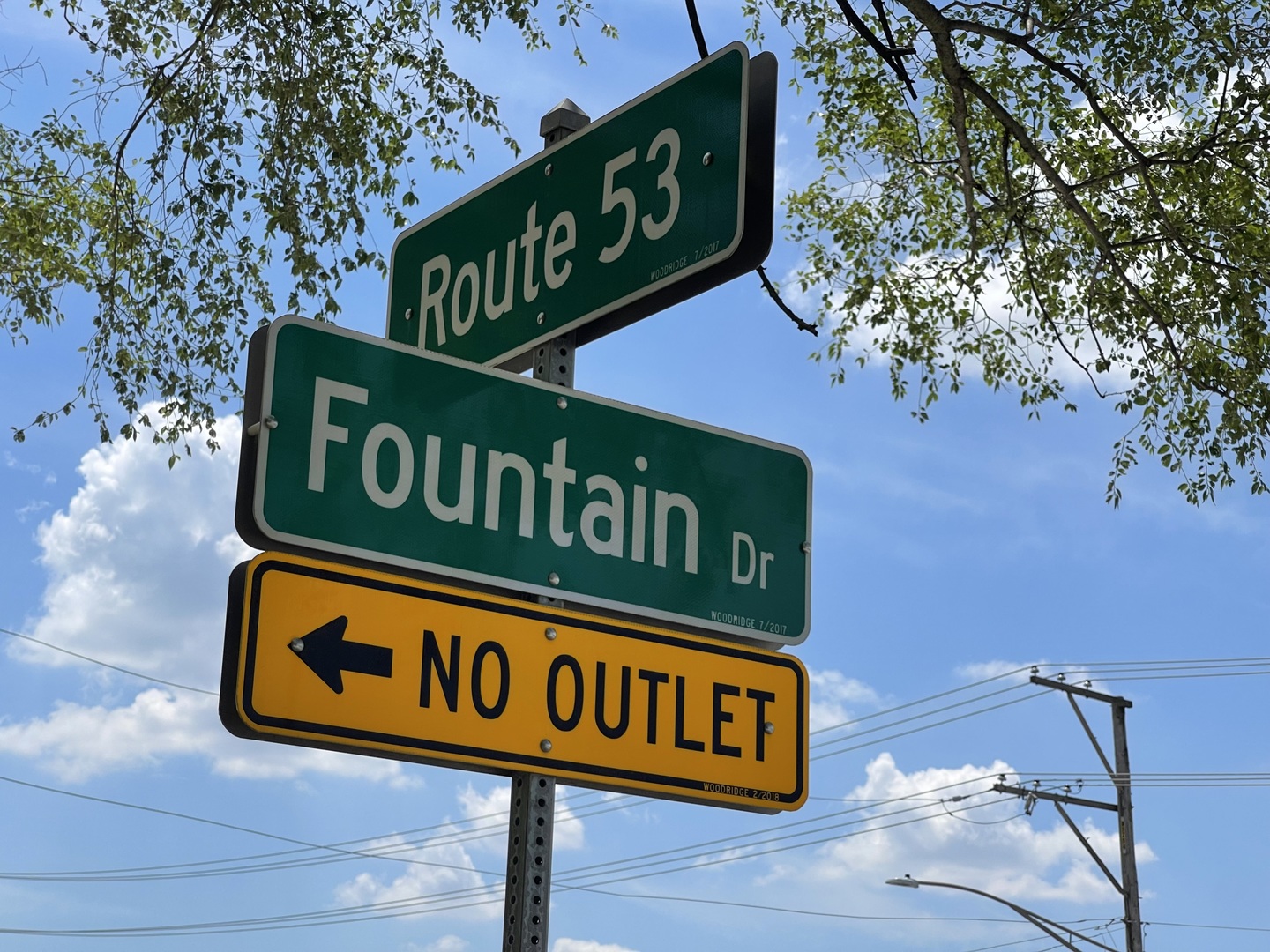 a street sign that is on a pole