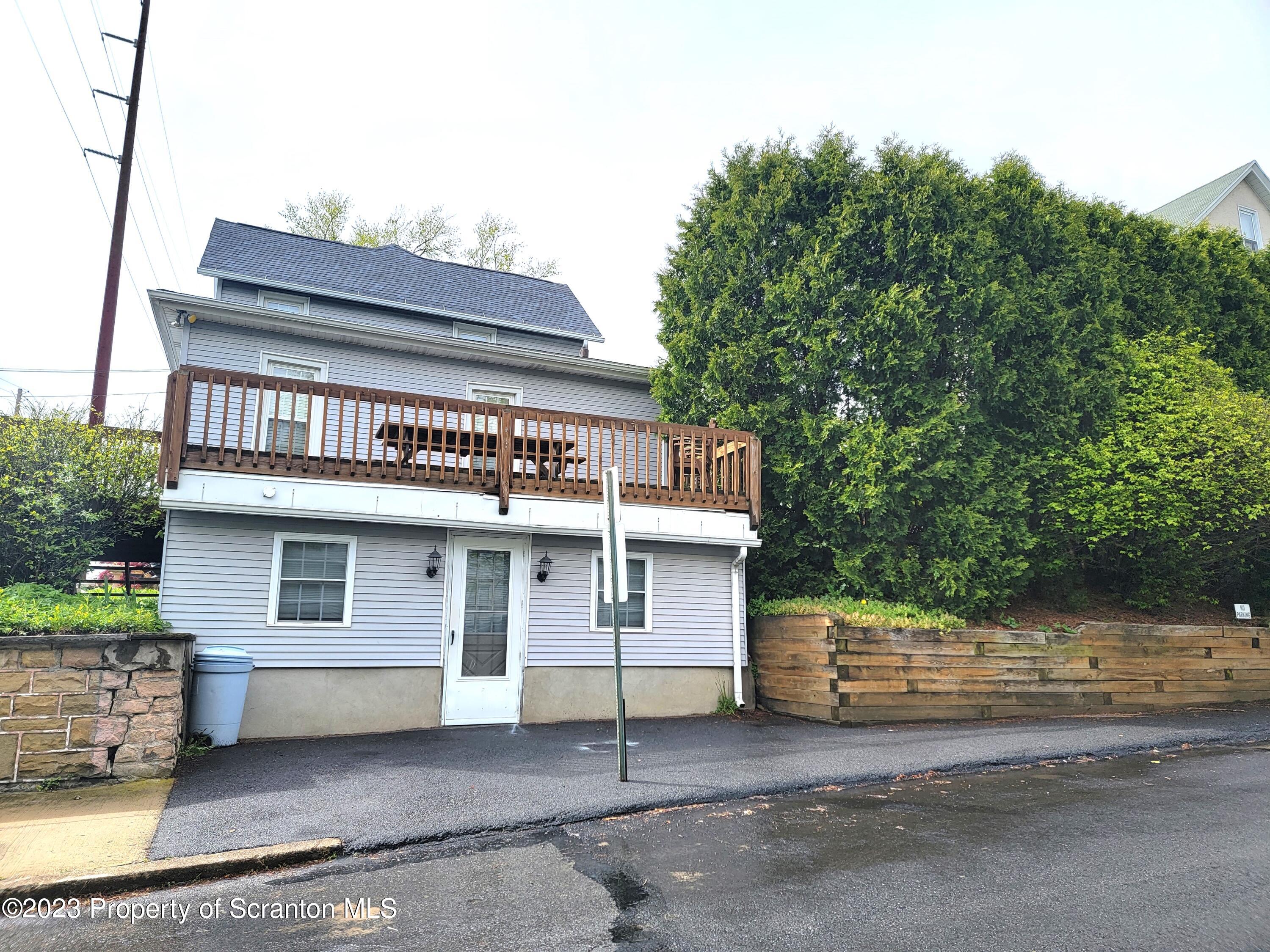 a front view of a house with a garage