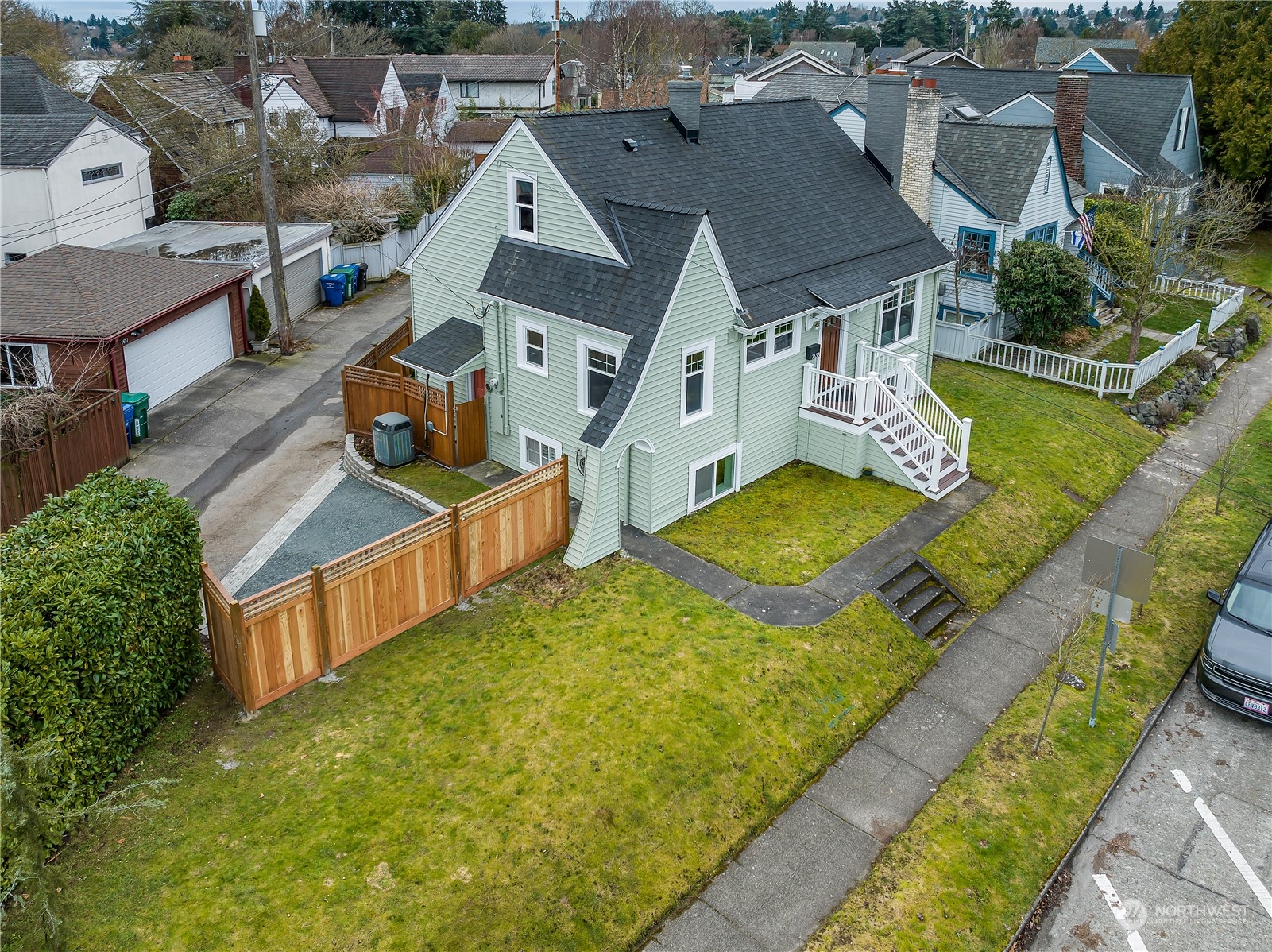 an aerial view of a house with a garden