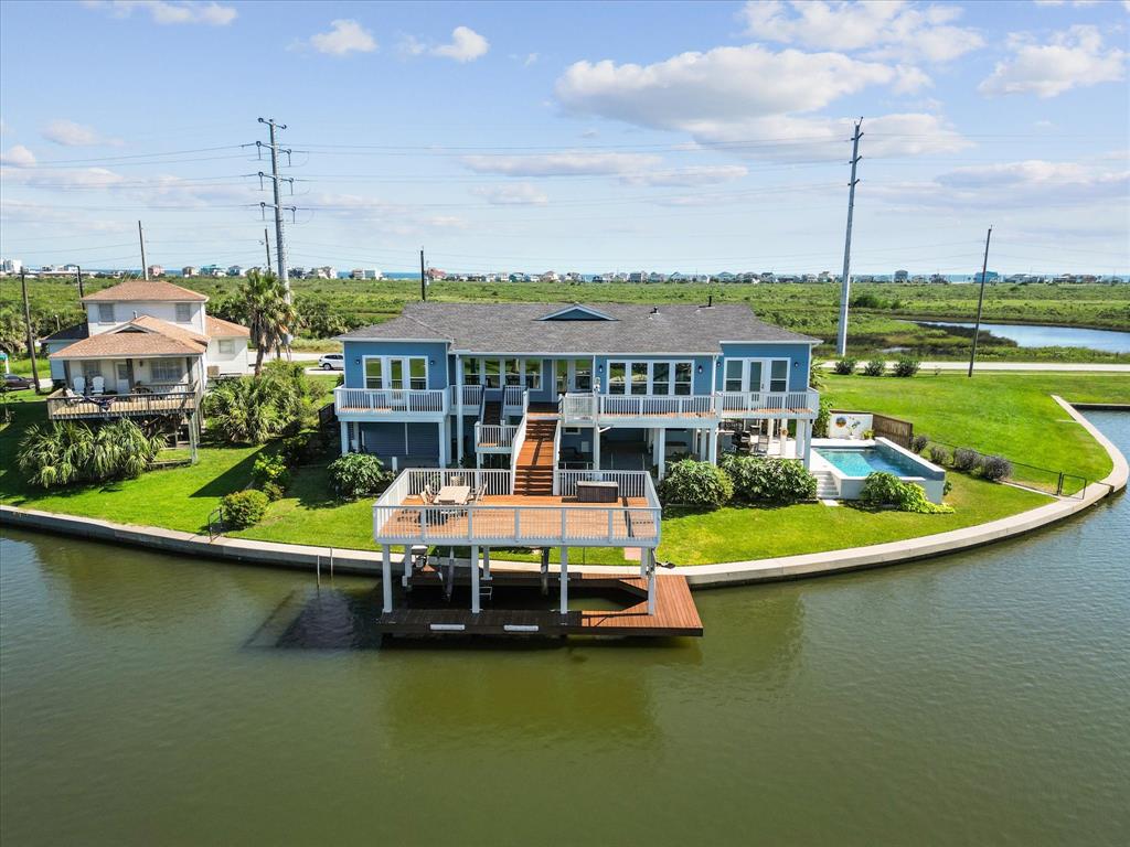 a view of a lake with a sitting area