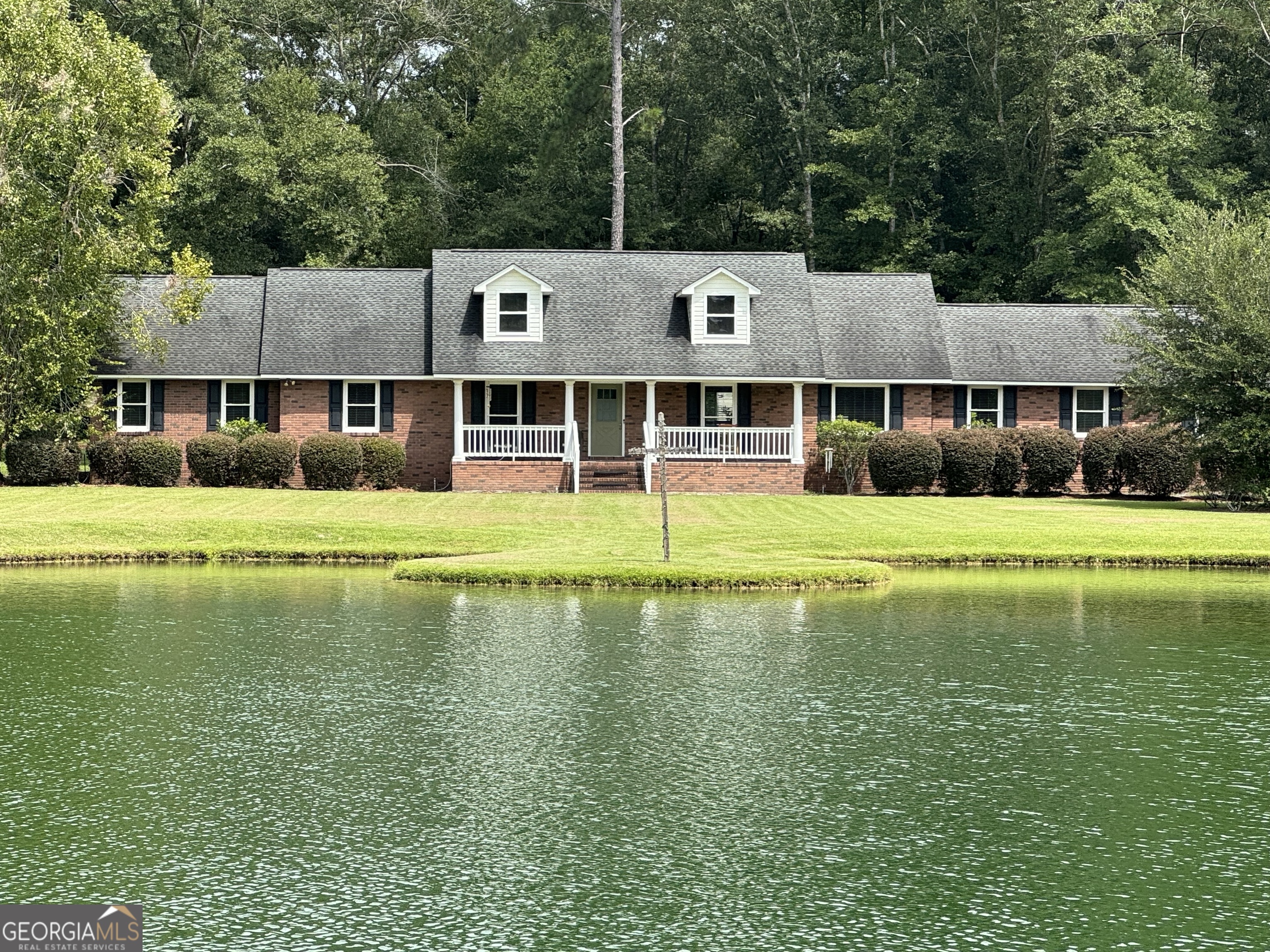 a view of a house with a swimming pool