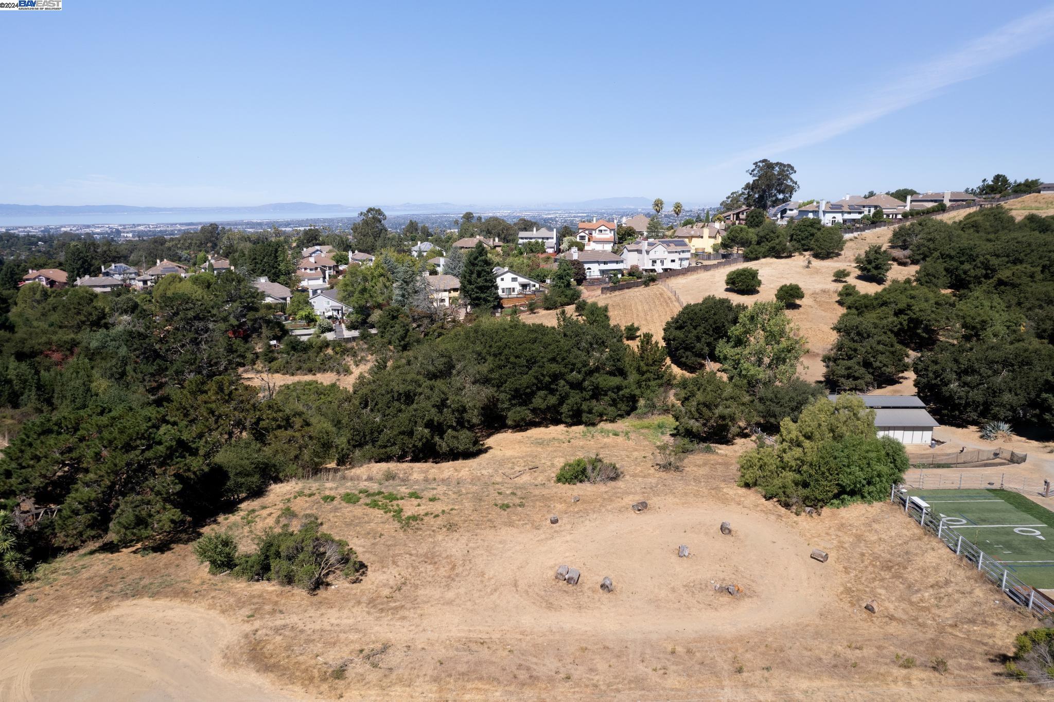 an aerial view of beach and yard