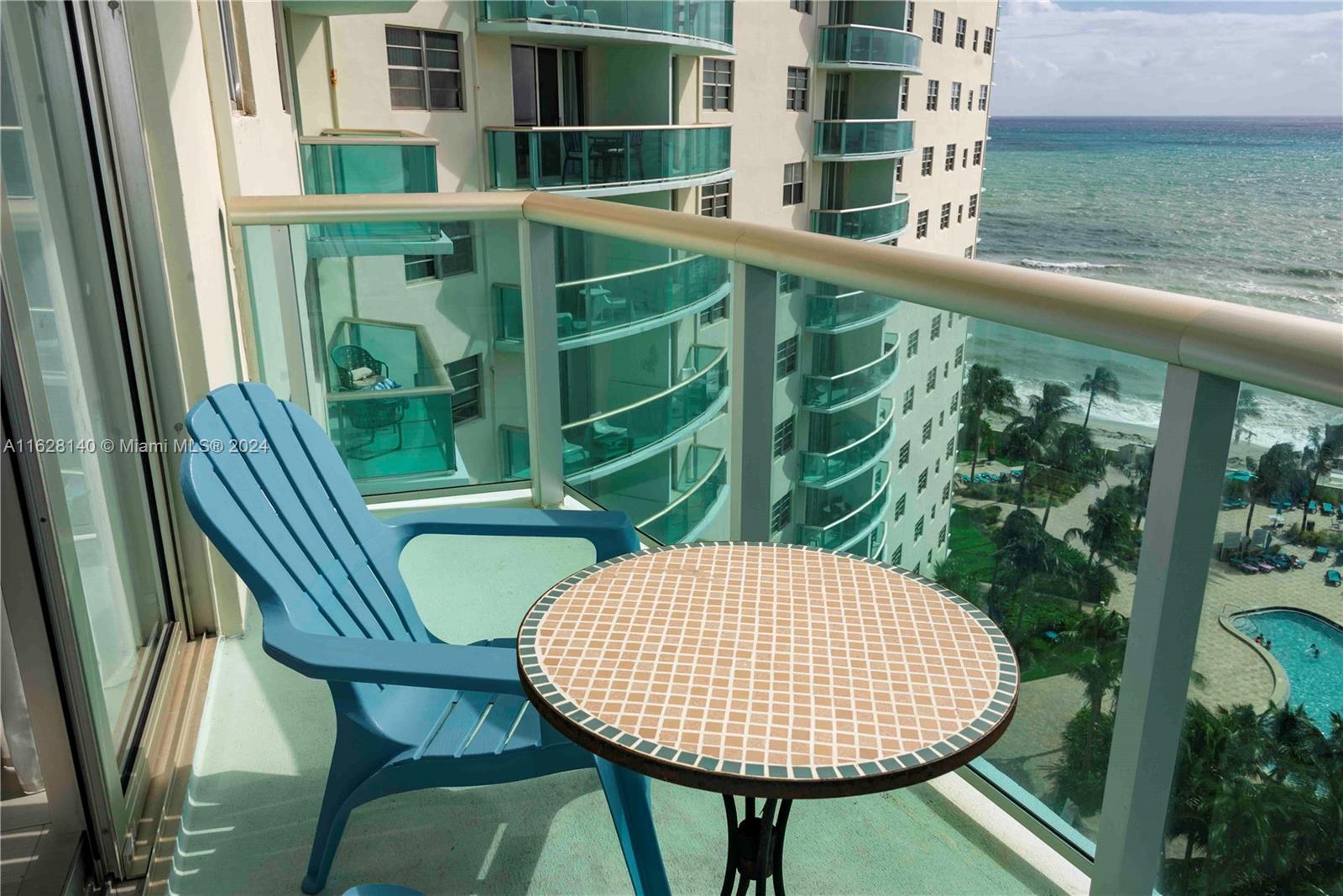 a view of balcony with a swimming pool