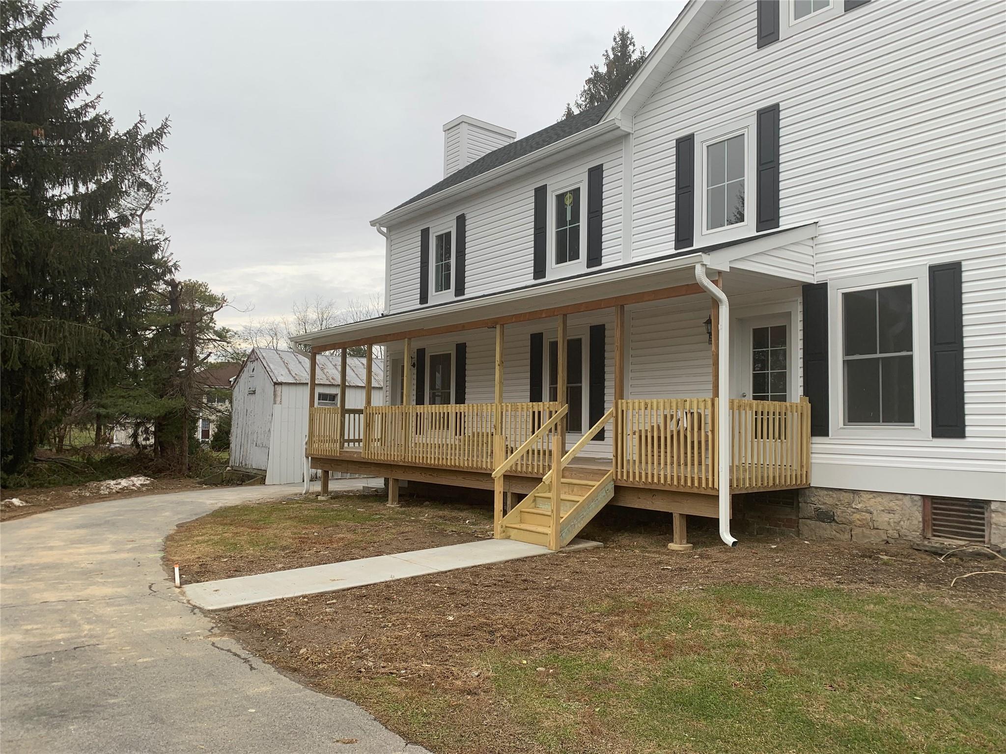 View of front facade featuring a porch