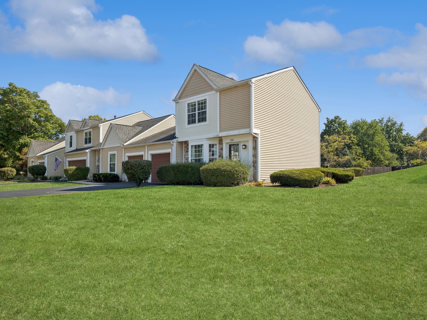 a view of a house with a back yard