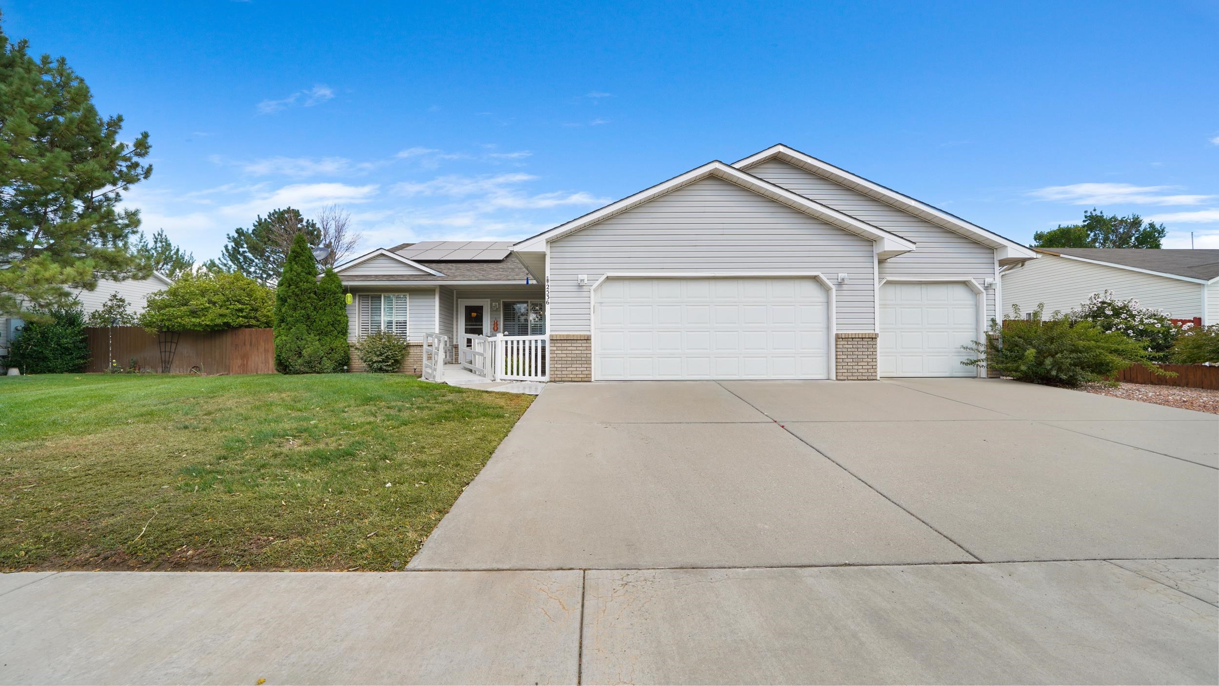 front view of house with a yard