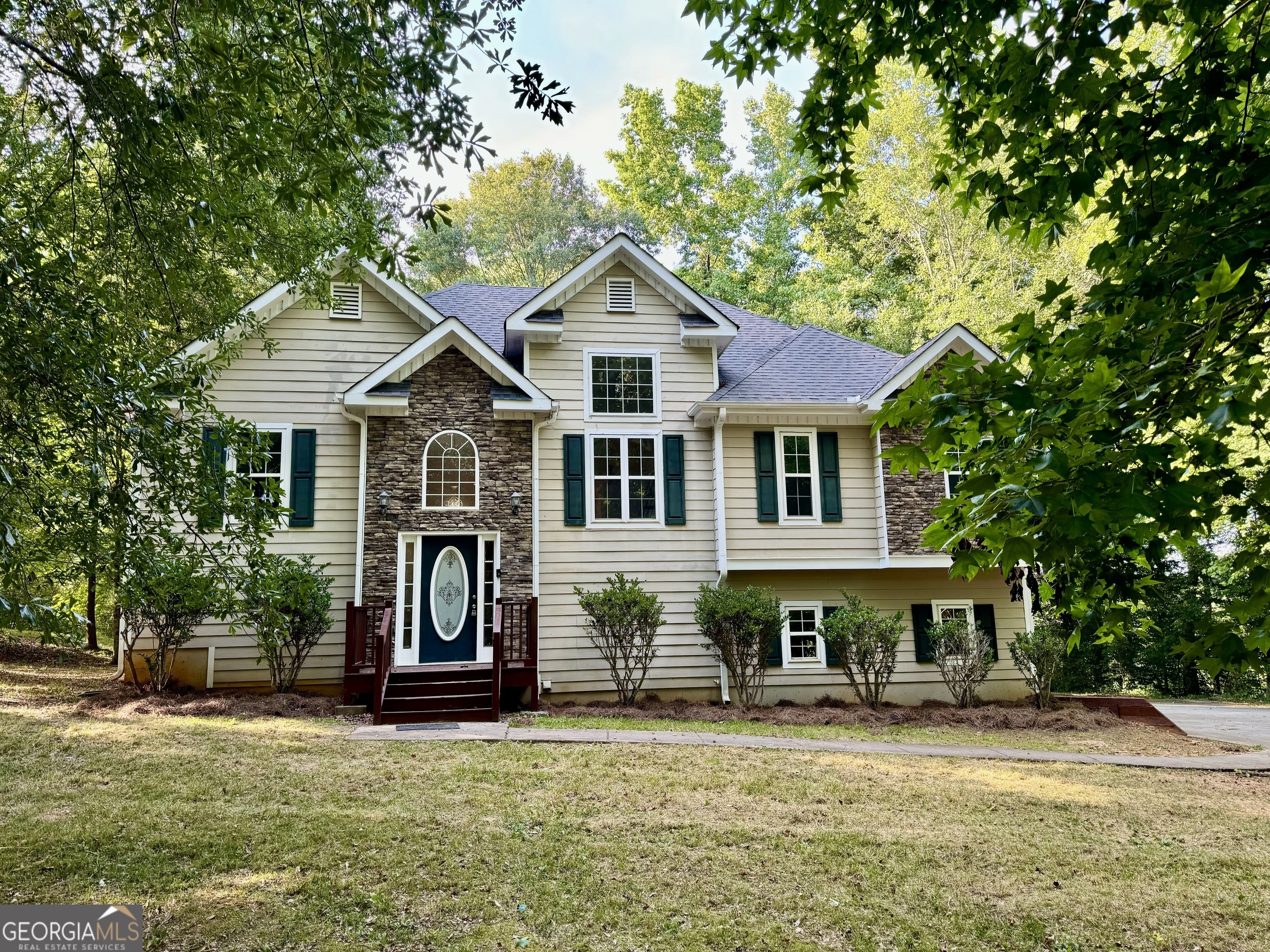 a house view with a garden space