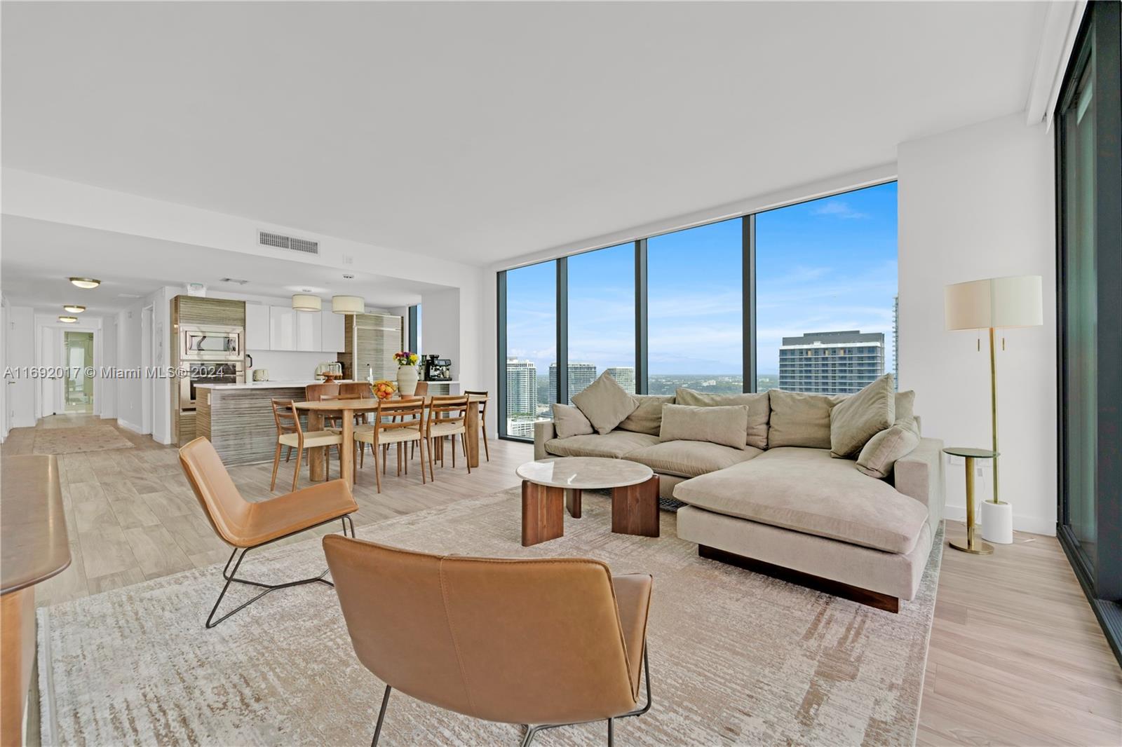 a living room with furniture and a table