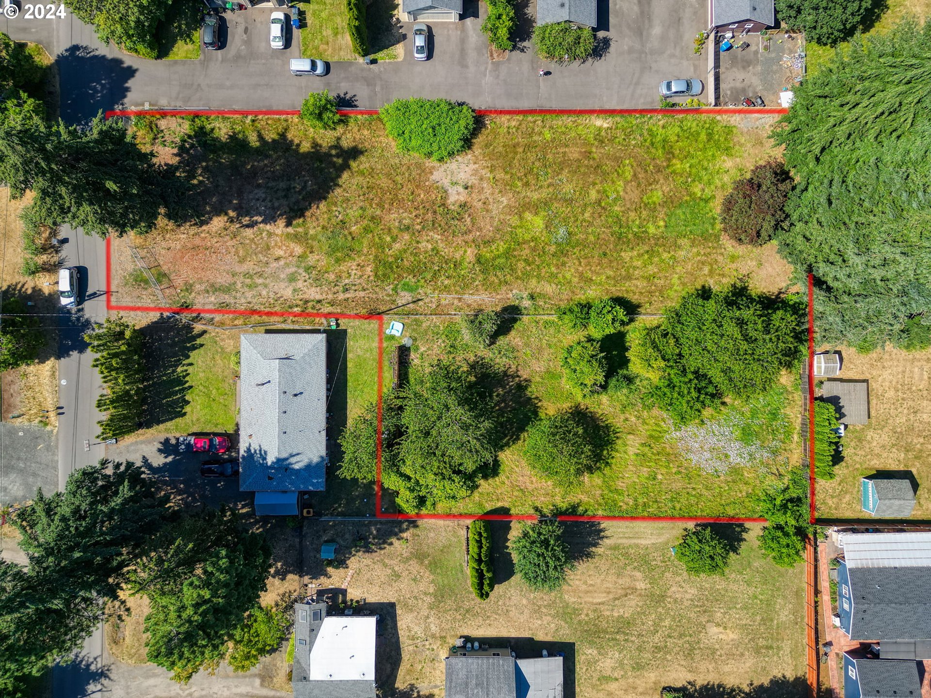 an aerial view of residential house with outdoor space