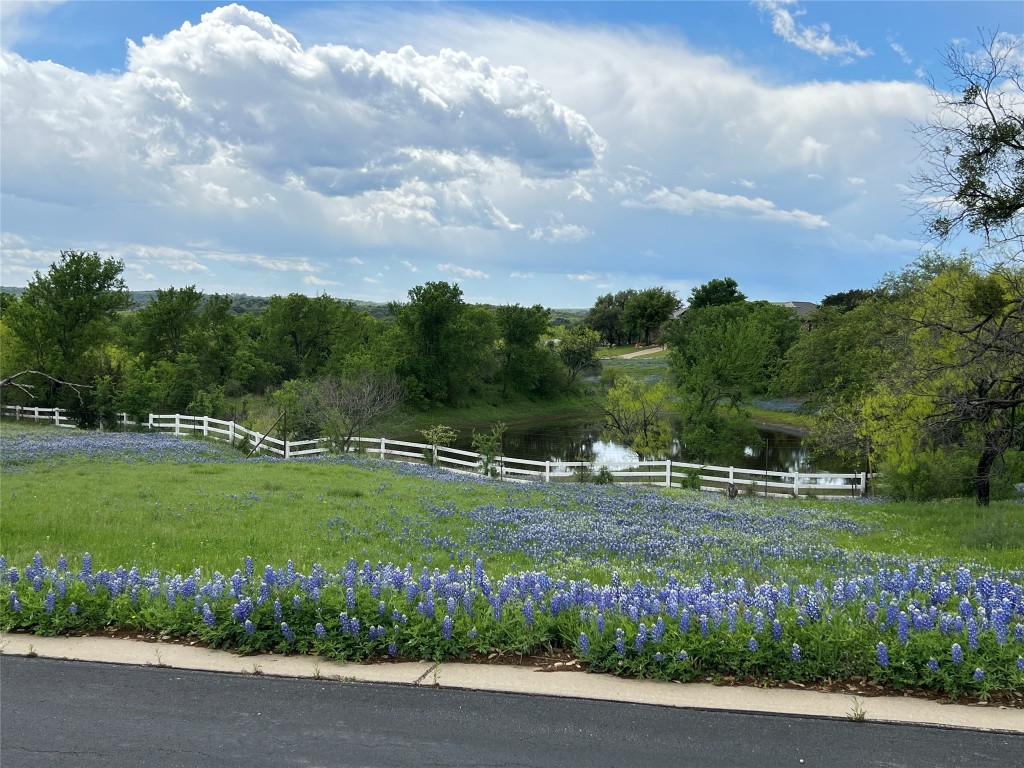 a view of a golf course with green space