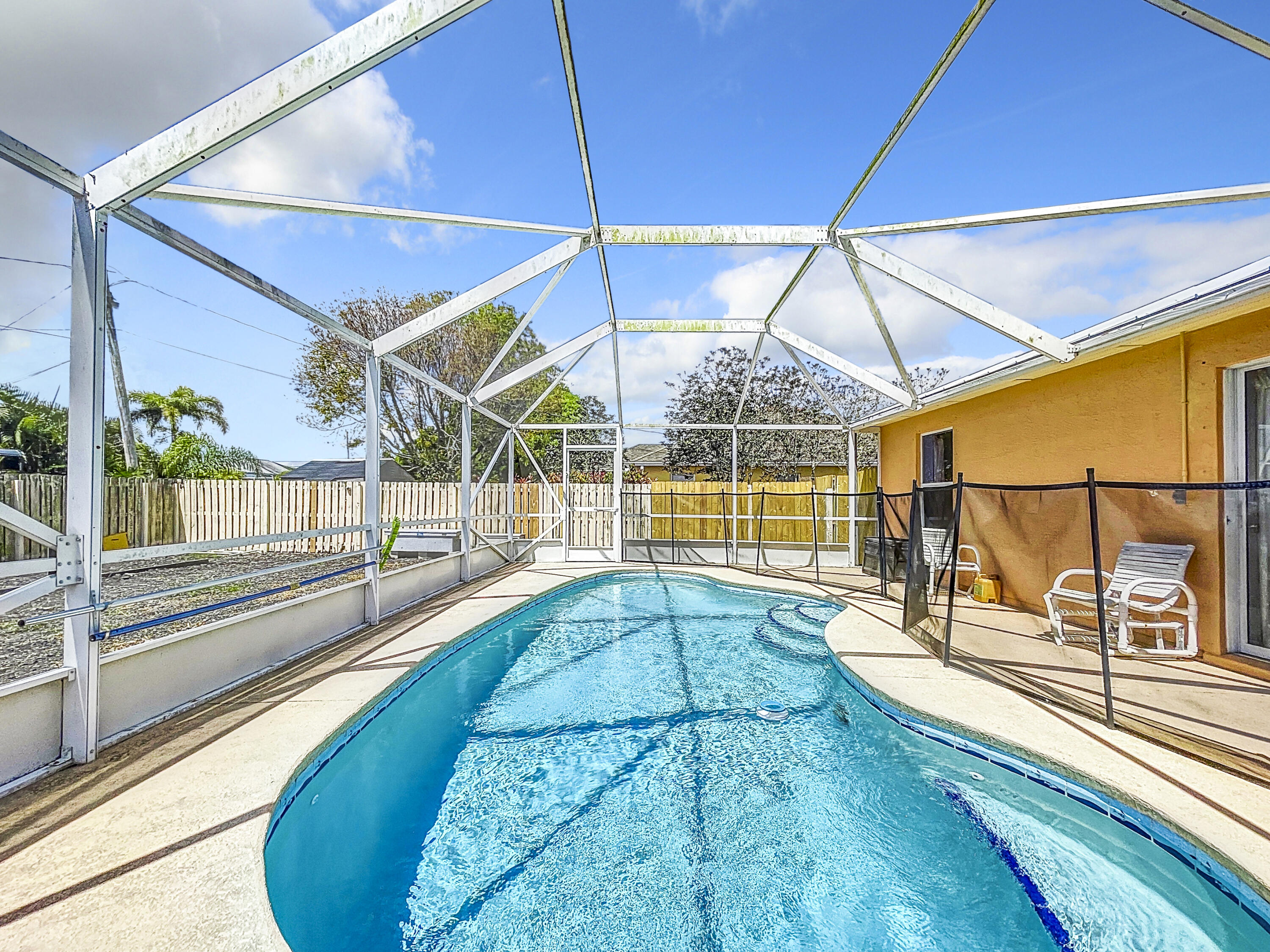 a view of a backyard of a house