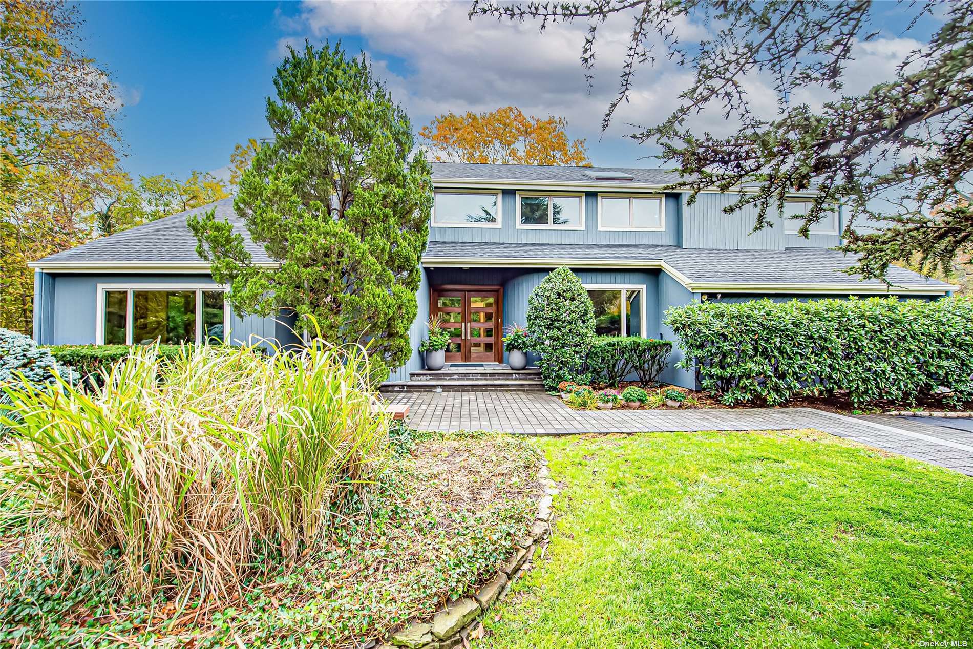 front view of a house with a yard