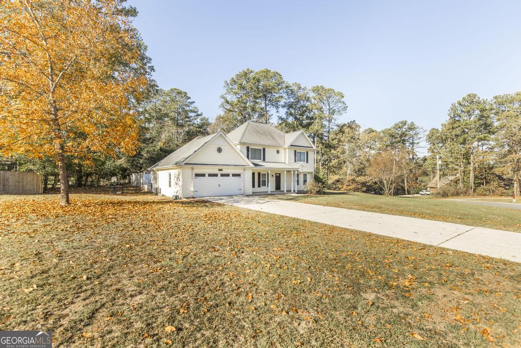 a house with trees in front of it