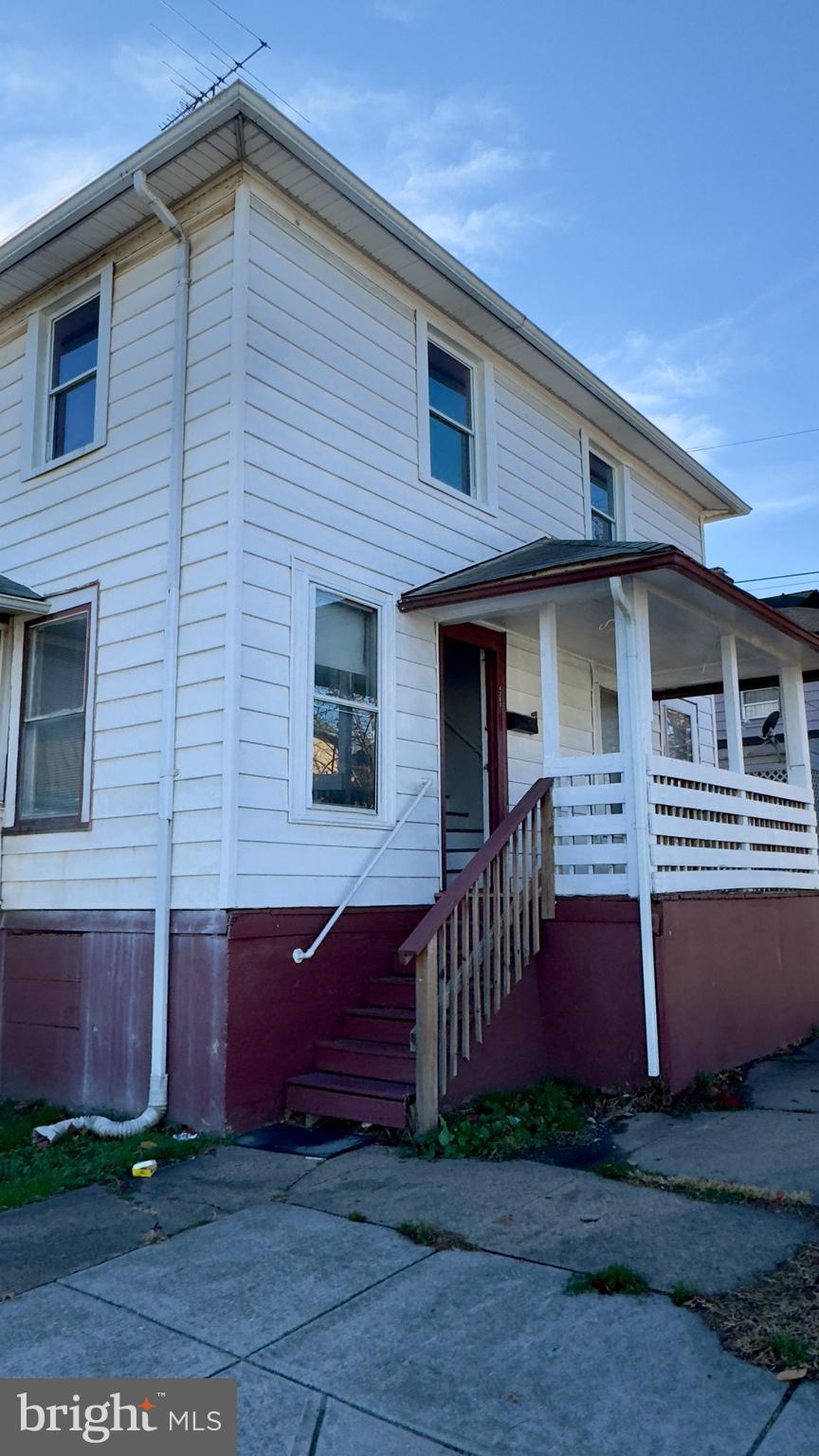 a front view of a house with yard