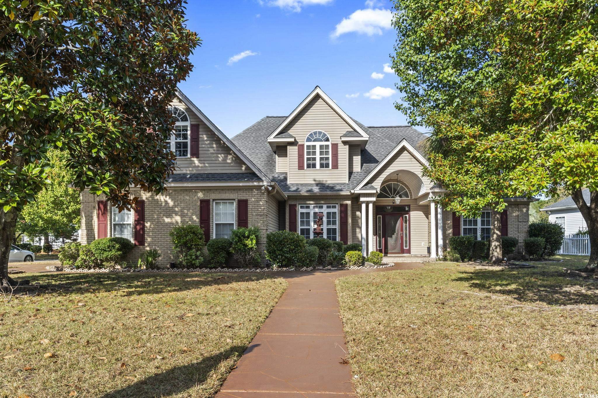 View of front facade with a front lawn