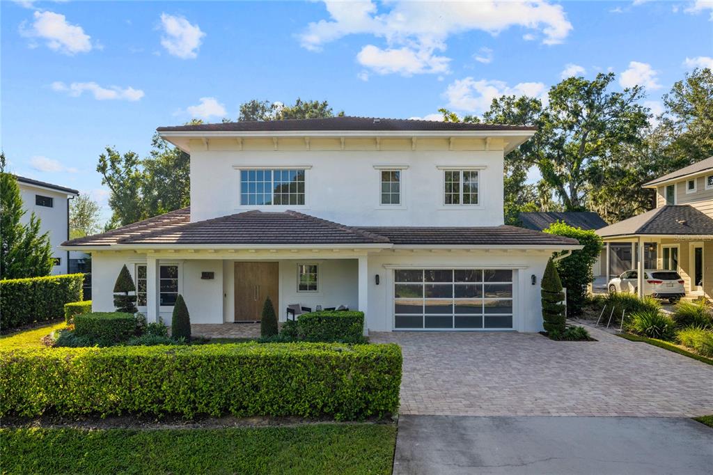 front view of a house with a yard