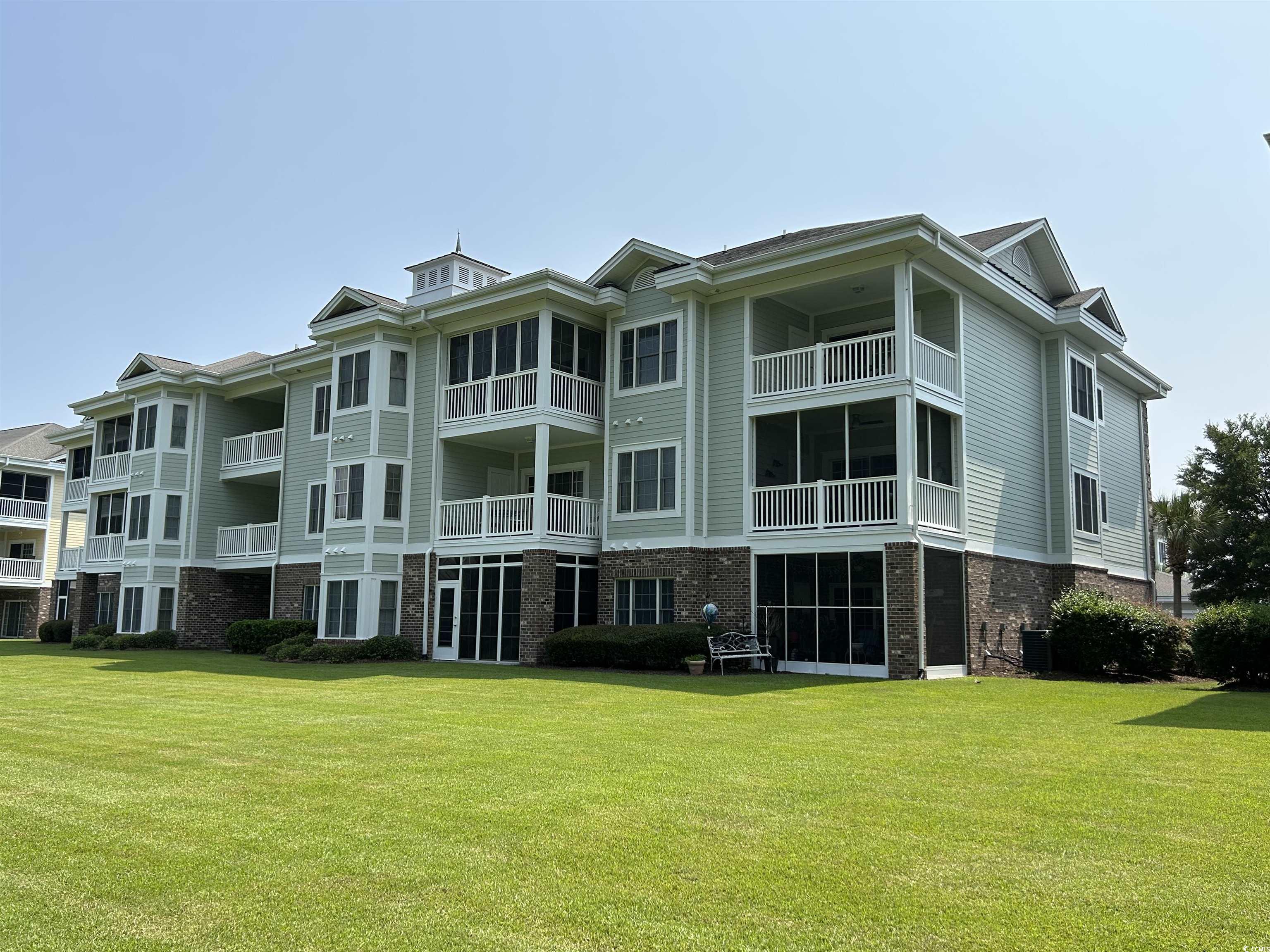 View of property featuring central air condition u