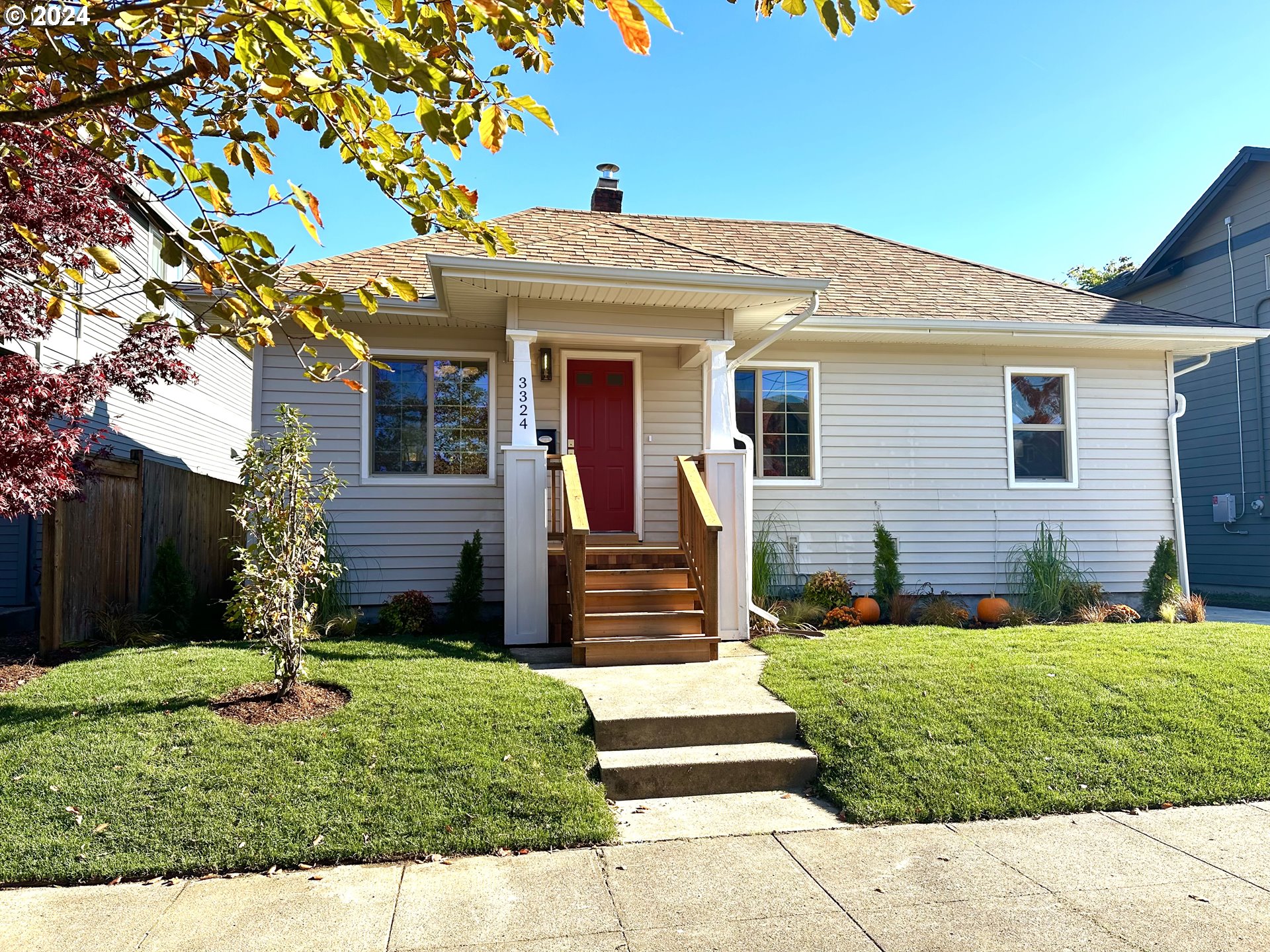 a front view of a house with a yard