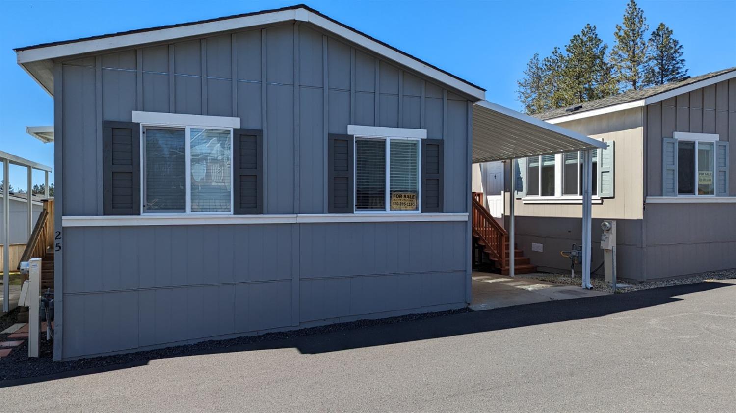 a front view of a house with a garage