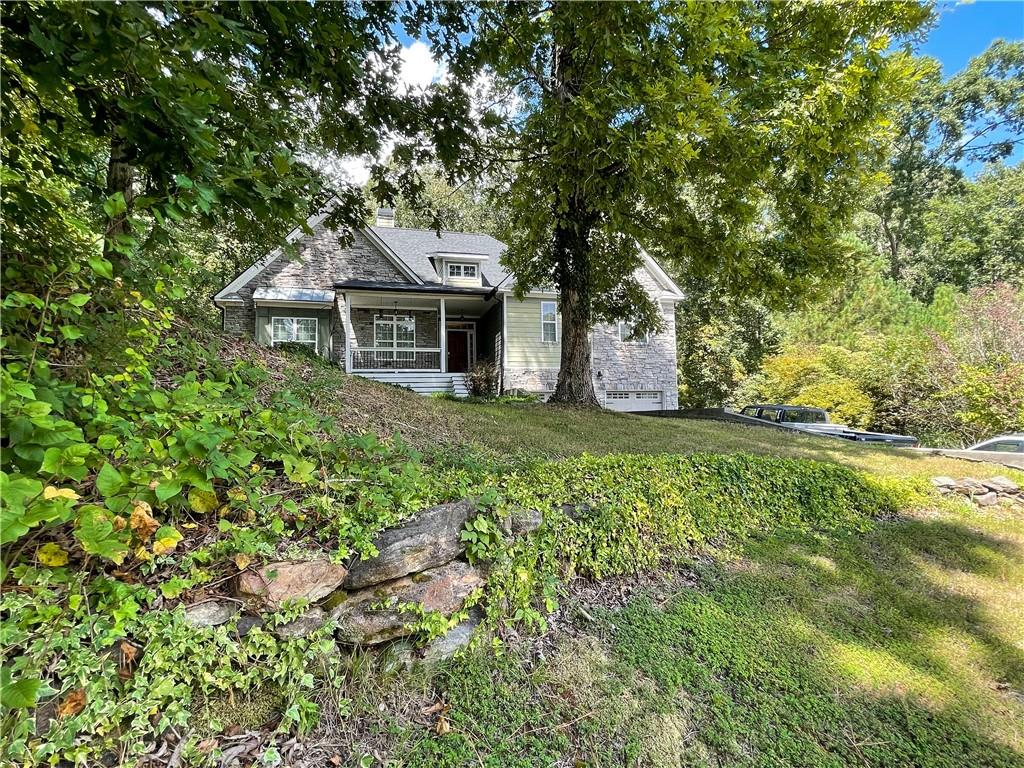 a front view of a house with yard