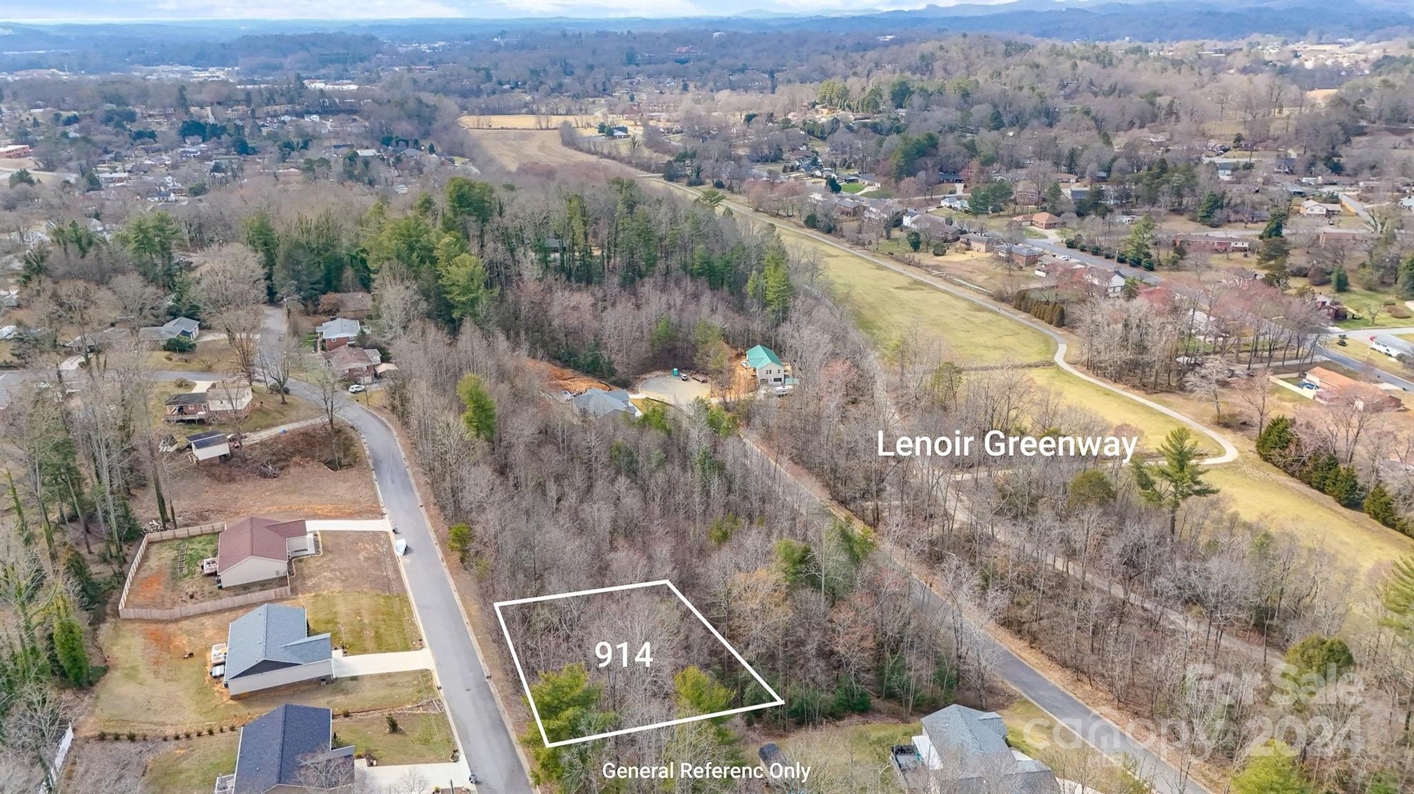 an aerial view of residential house with outdoor space