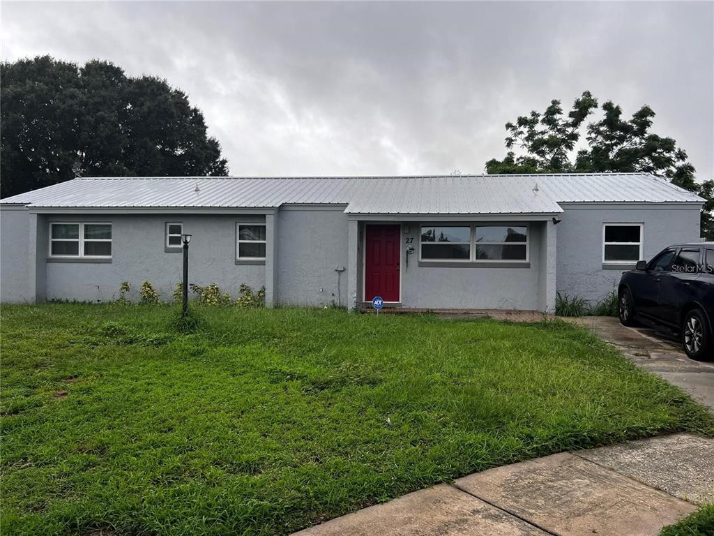 front view of house with a yard