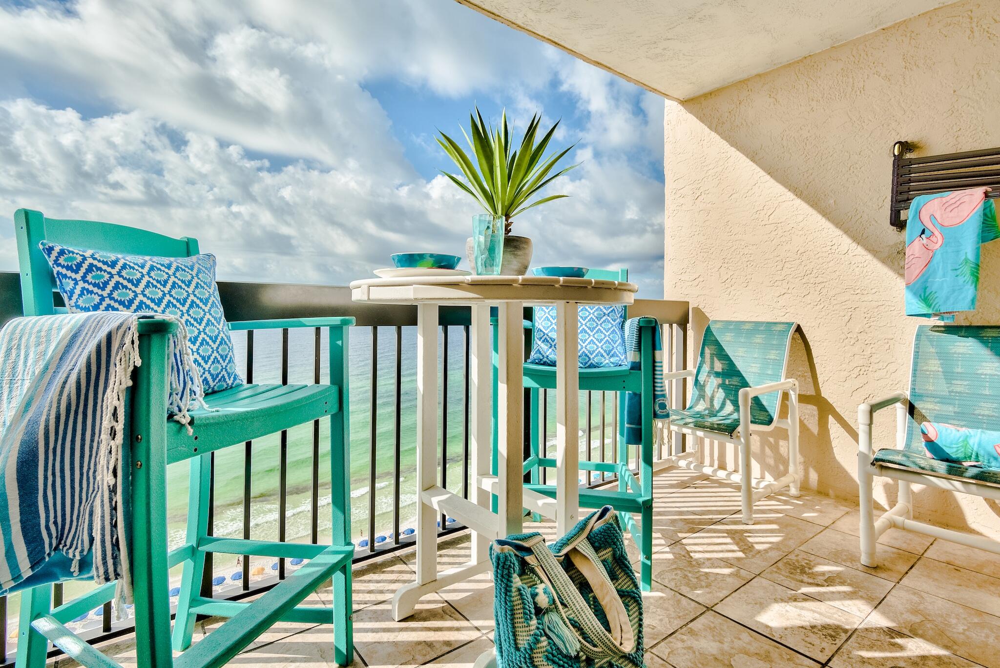 a view of balcony with furniture