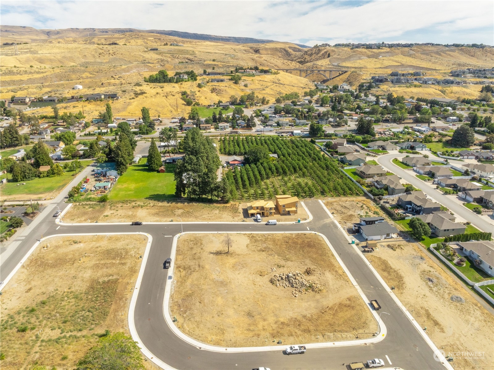 an aerial view of residential houses with outdoor space